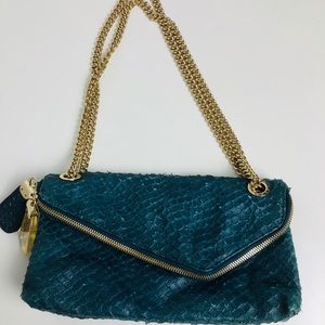 Henri Bendel leather purse with chain.
